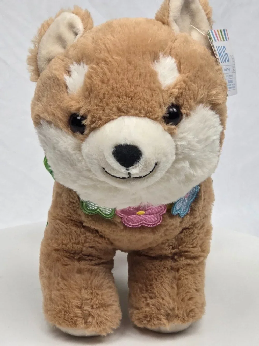Plush Tan & White Hug Me Beach Dog Plush 11” With Tutu And Flower Collar